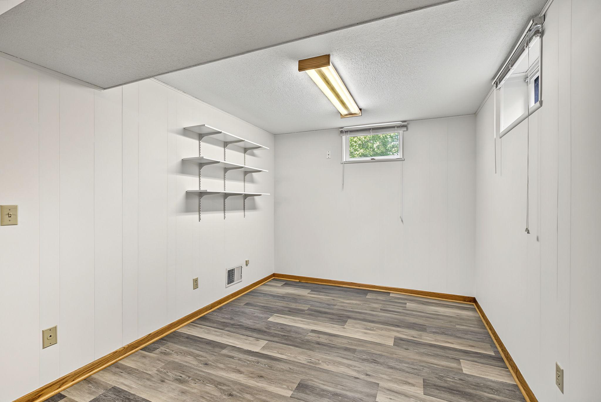 With the addition of an egress window and wall, this office area could be a 4th bedroom.