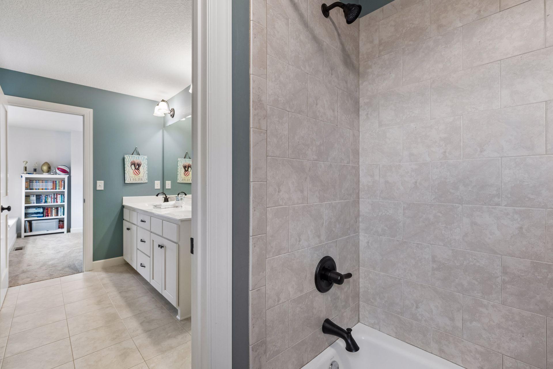 Full bath with tile surround