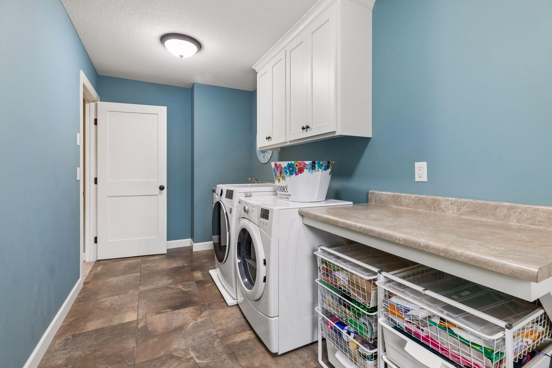 Ample storage in upper level laundry room