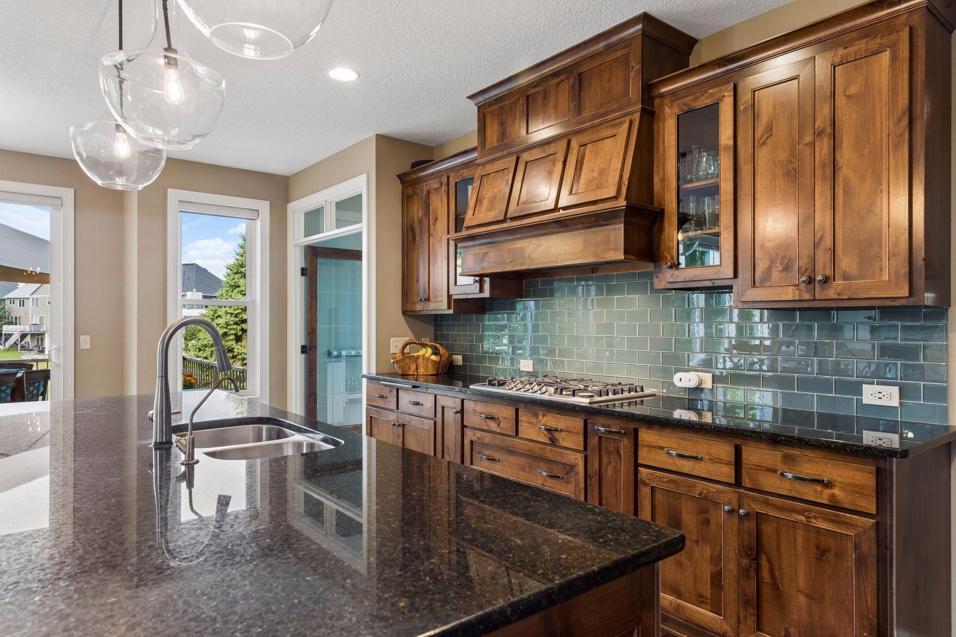Granite counters and custom tile backsplash