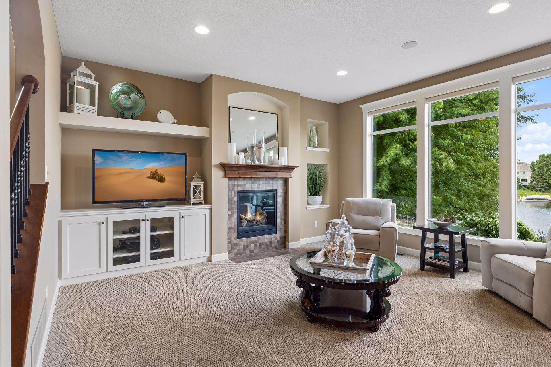 Living room with gas fireplace and built-ins