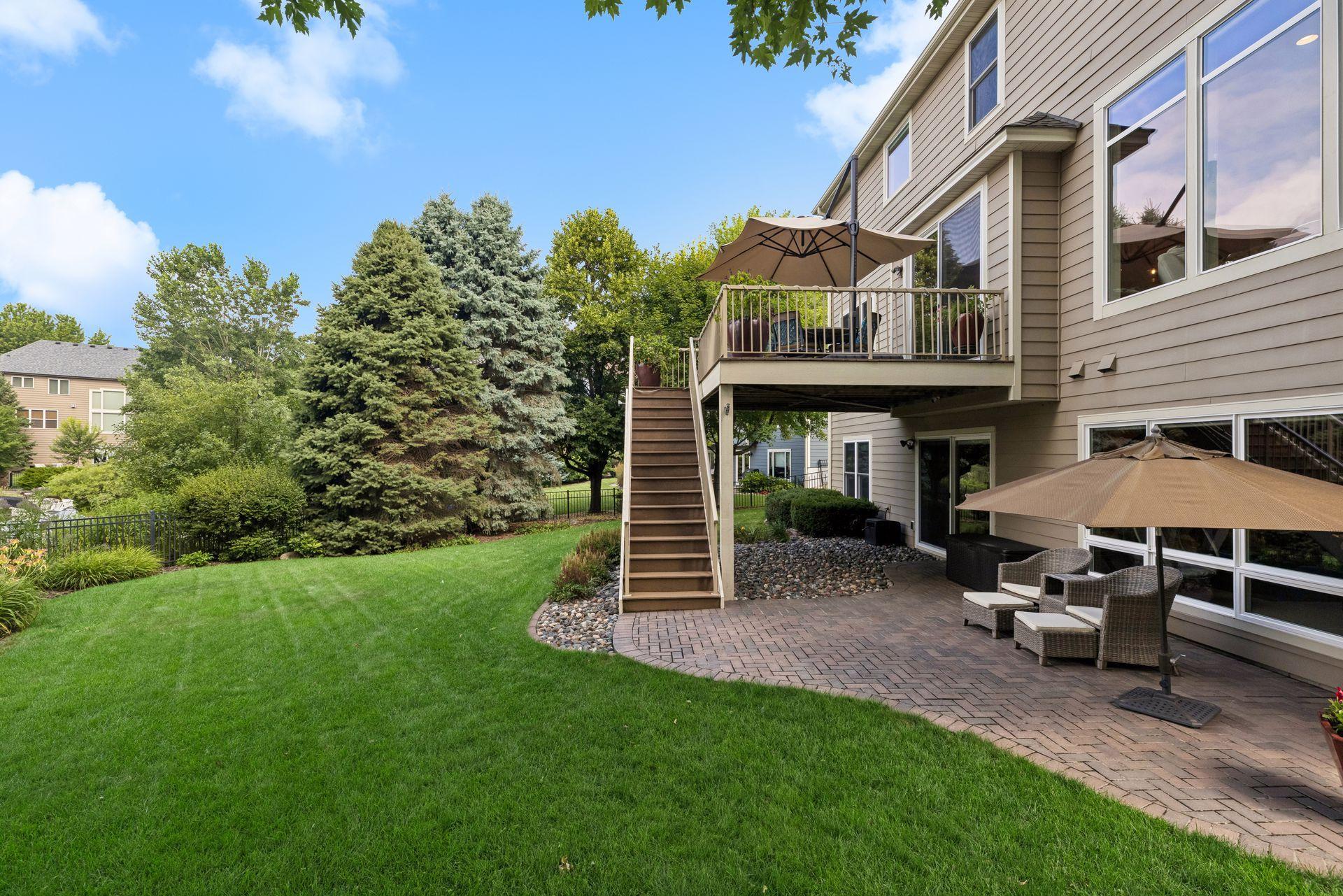 Fully-fenced rear yard, paver patio