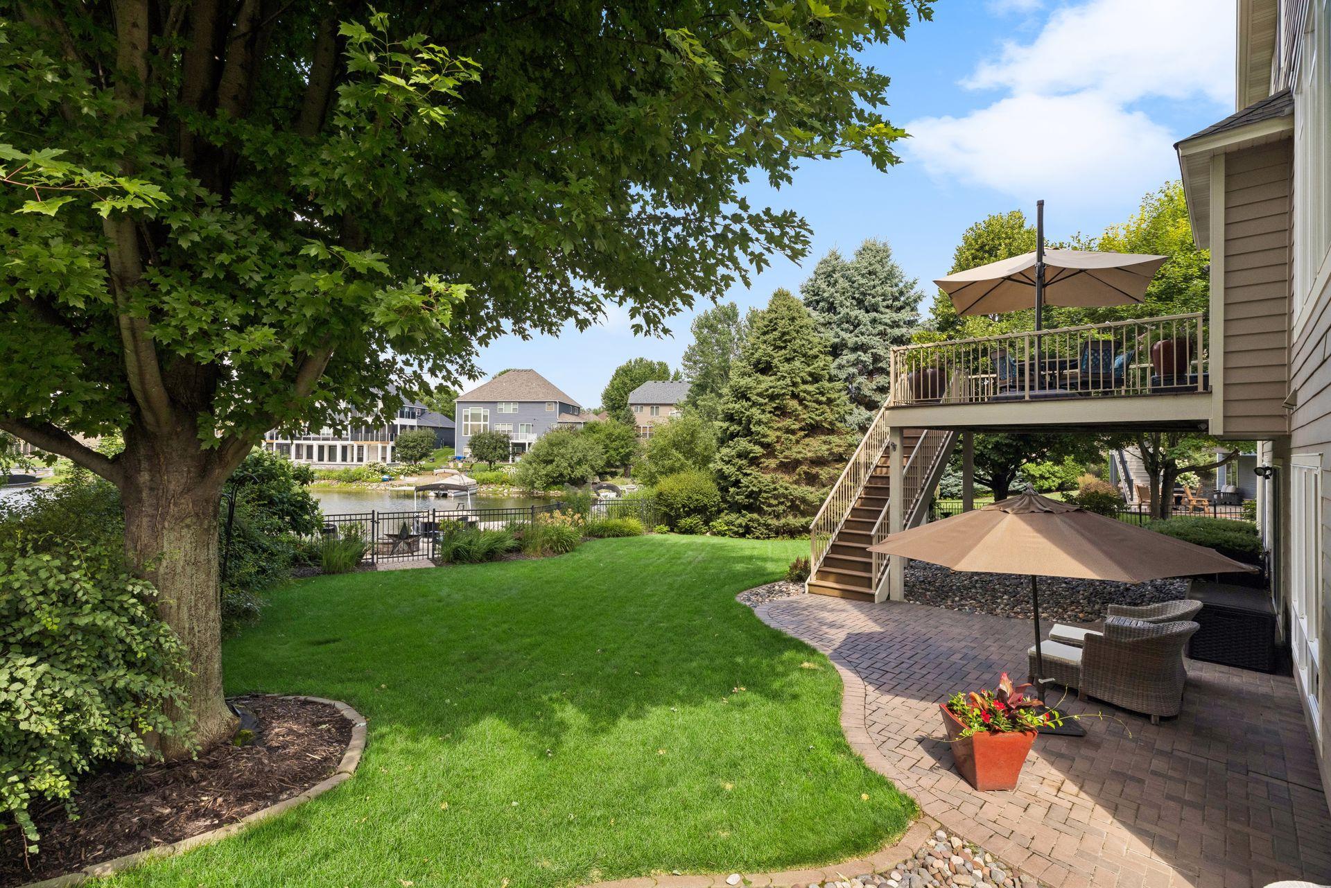 Fully-fenced rear yard, paver patio