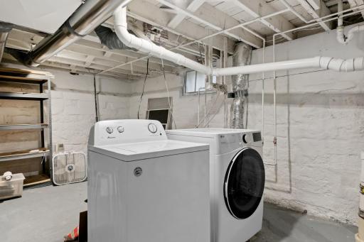 Clean, large open lower level with laundy. Tons of storage space.