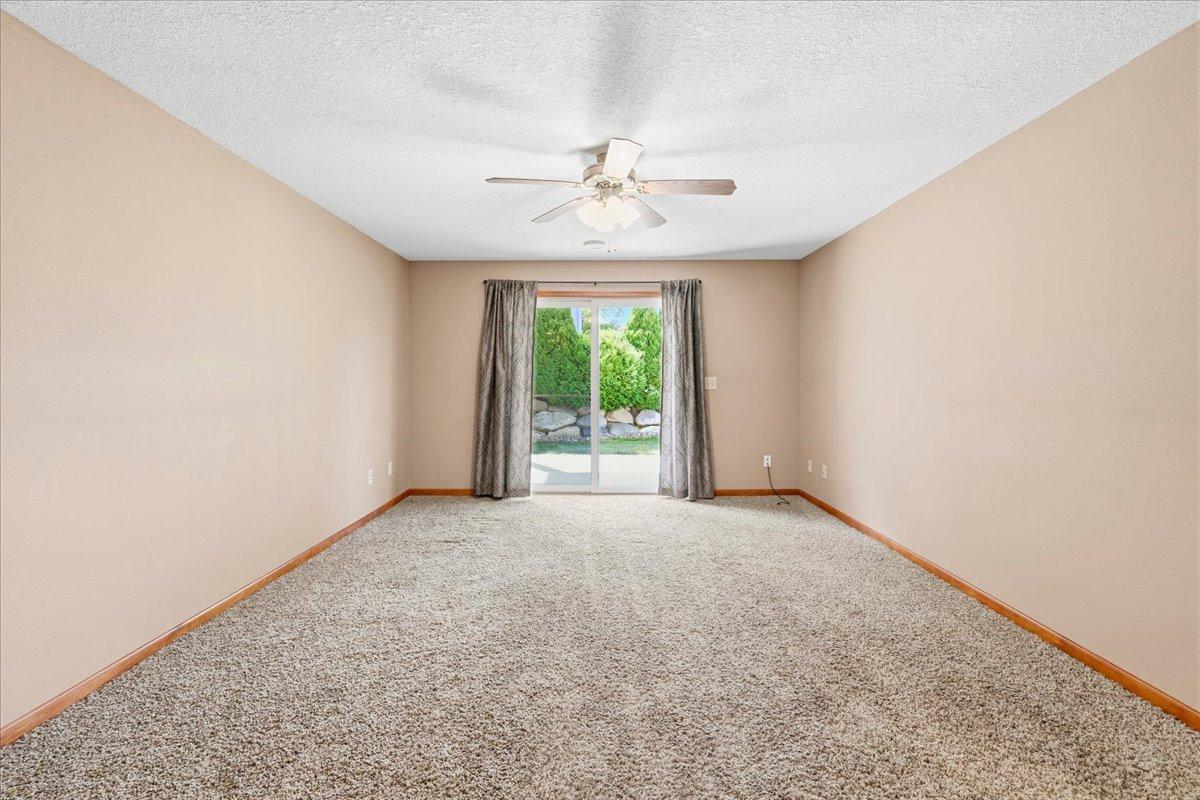 Family room in lower level with walk out patio