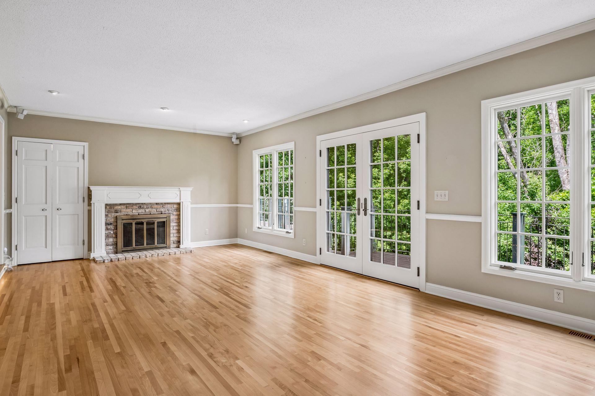 Newly refinished maple floors throughtout. Wood burning fireplace in living room