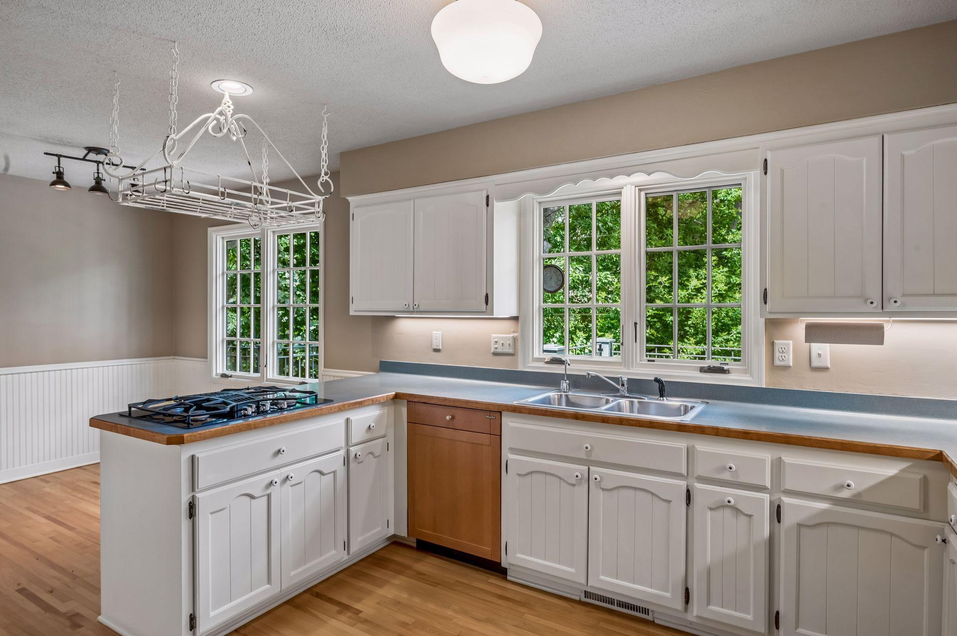 Cooktop with downward venting