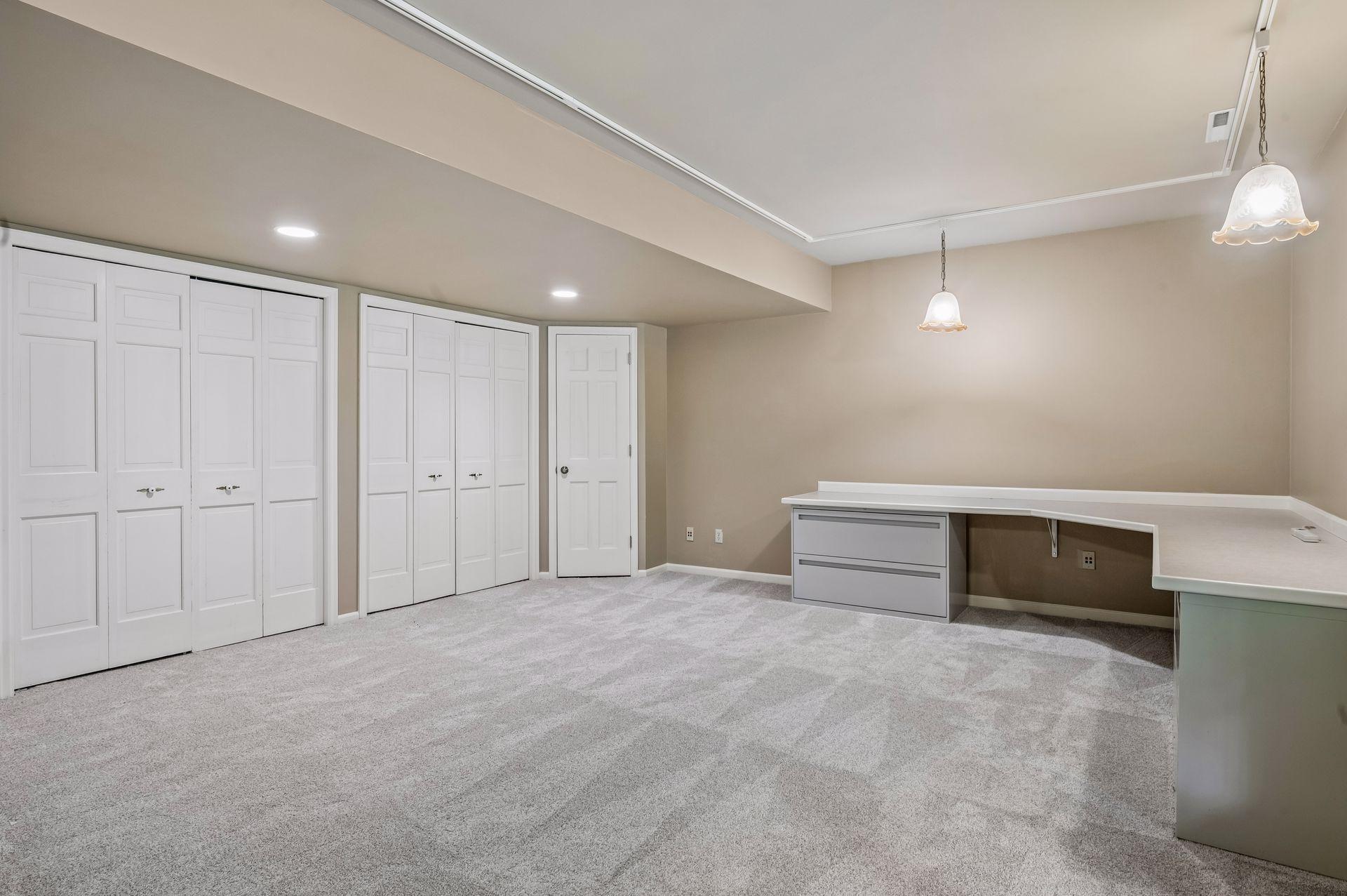 Bedroom 6 - lower level office with large closests