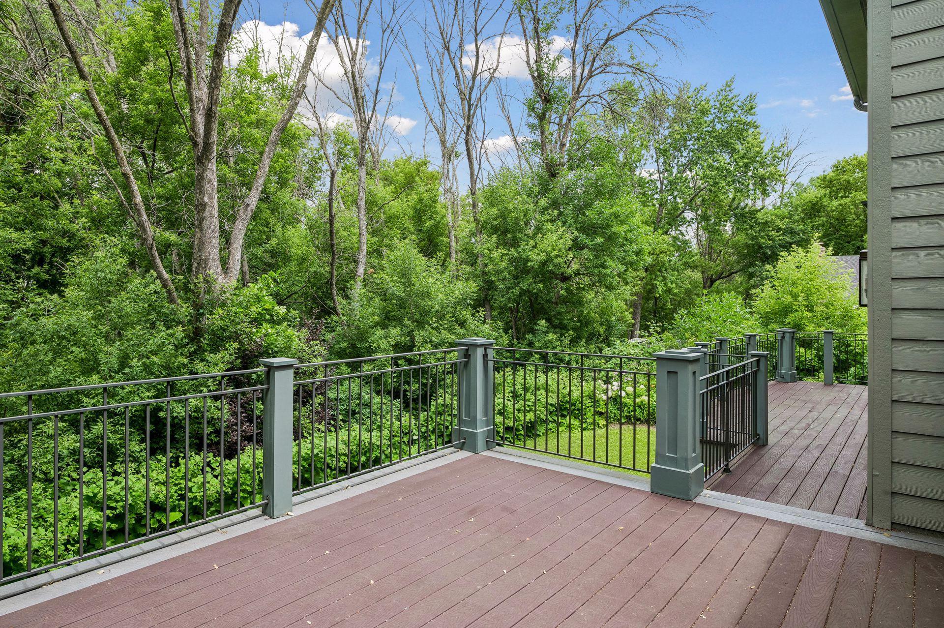 Large composite deck over private backyard