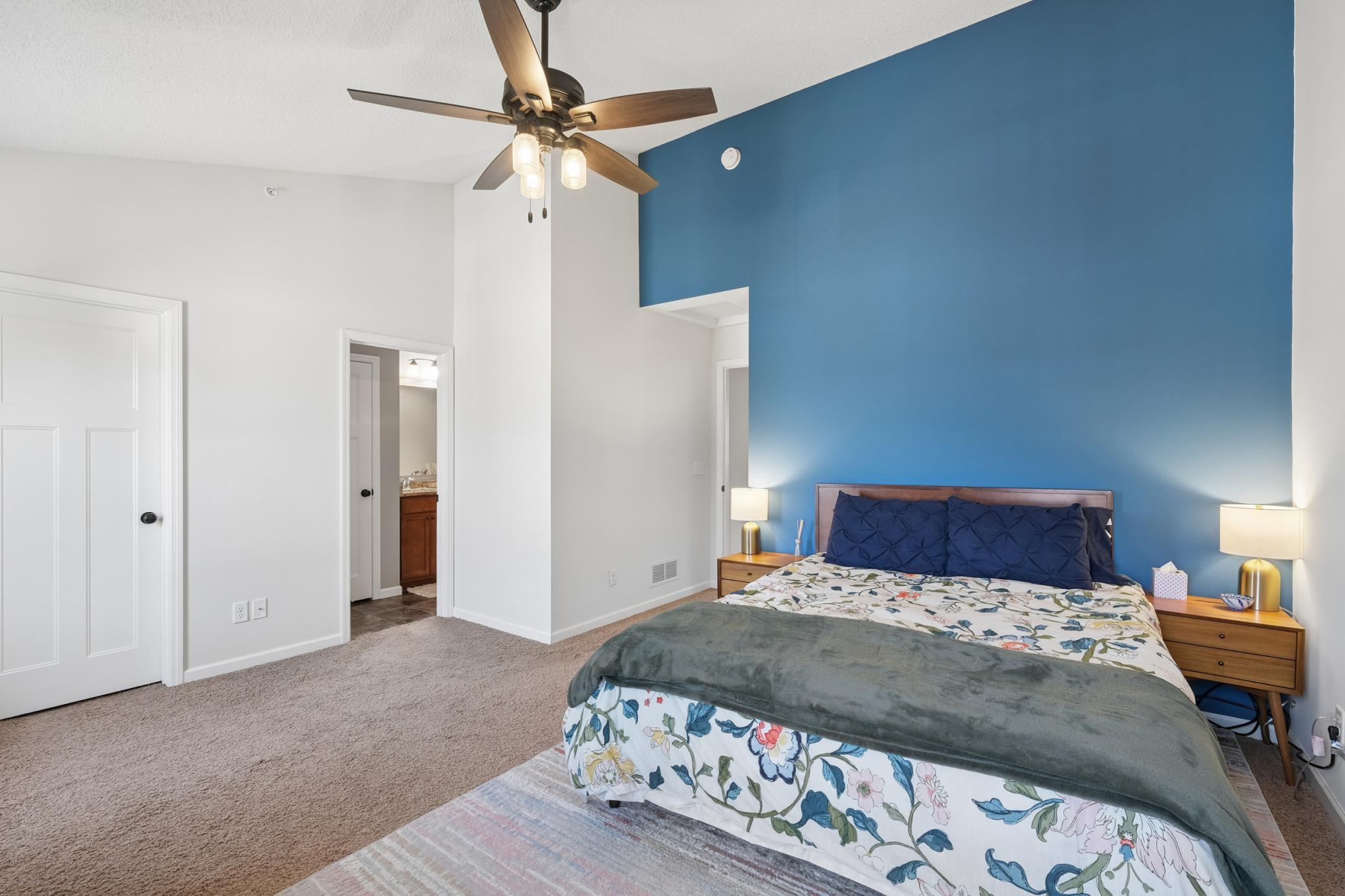 Primary bedroom with walk in closet and bath