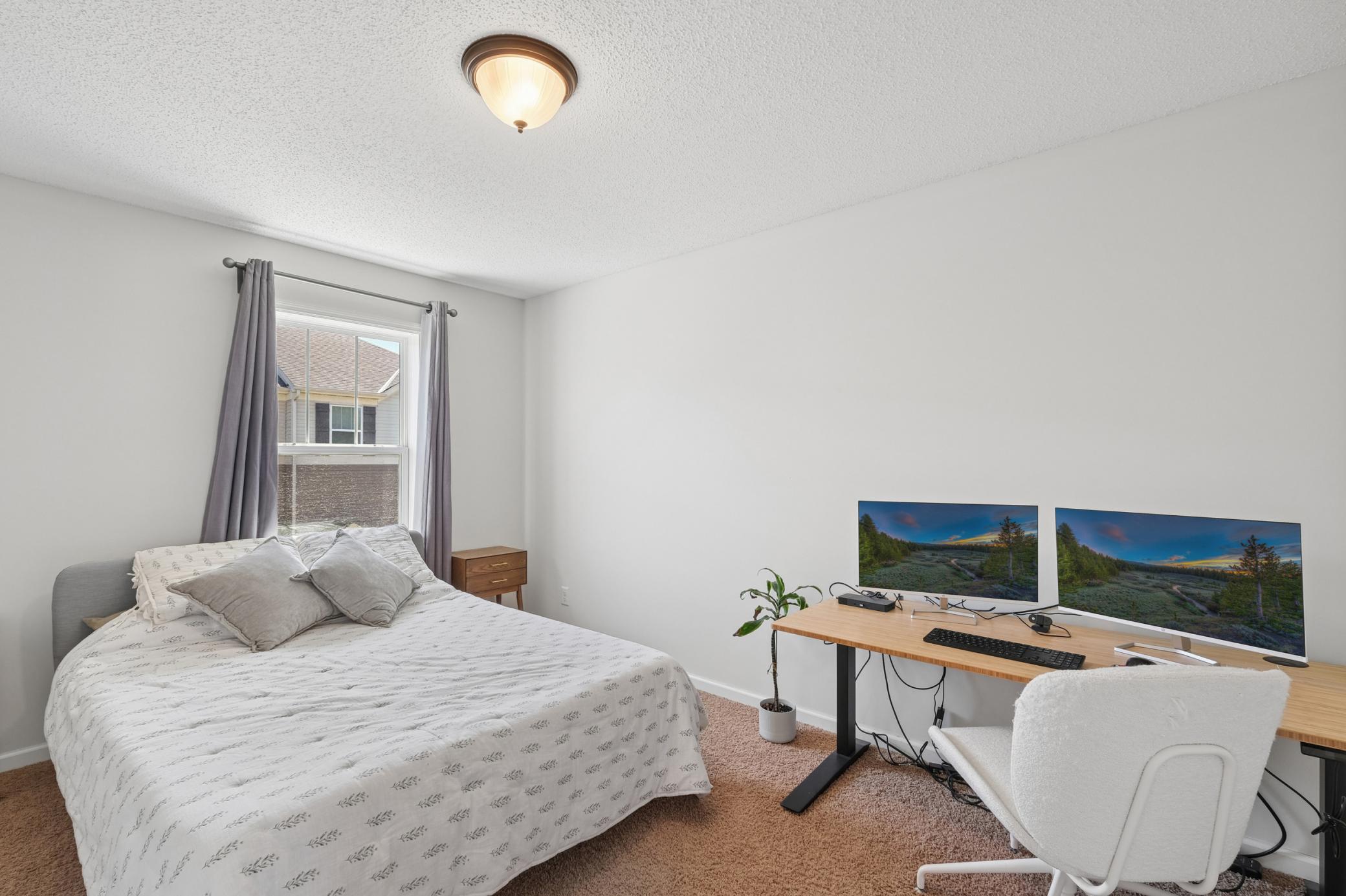 Oversized 2nd bedroom with south facing windows for tons of natural light