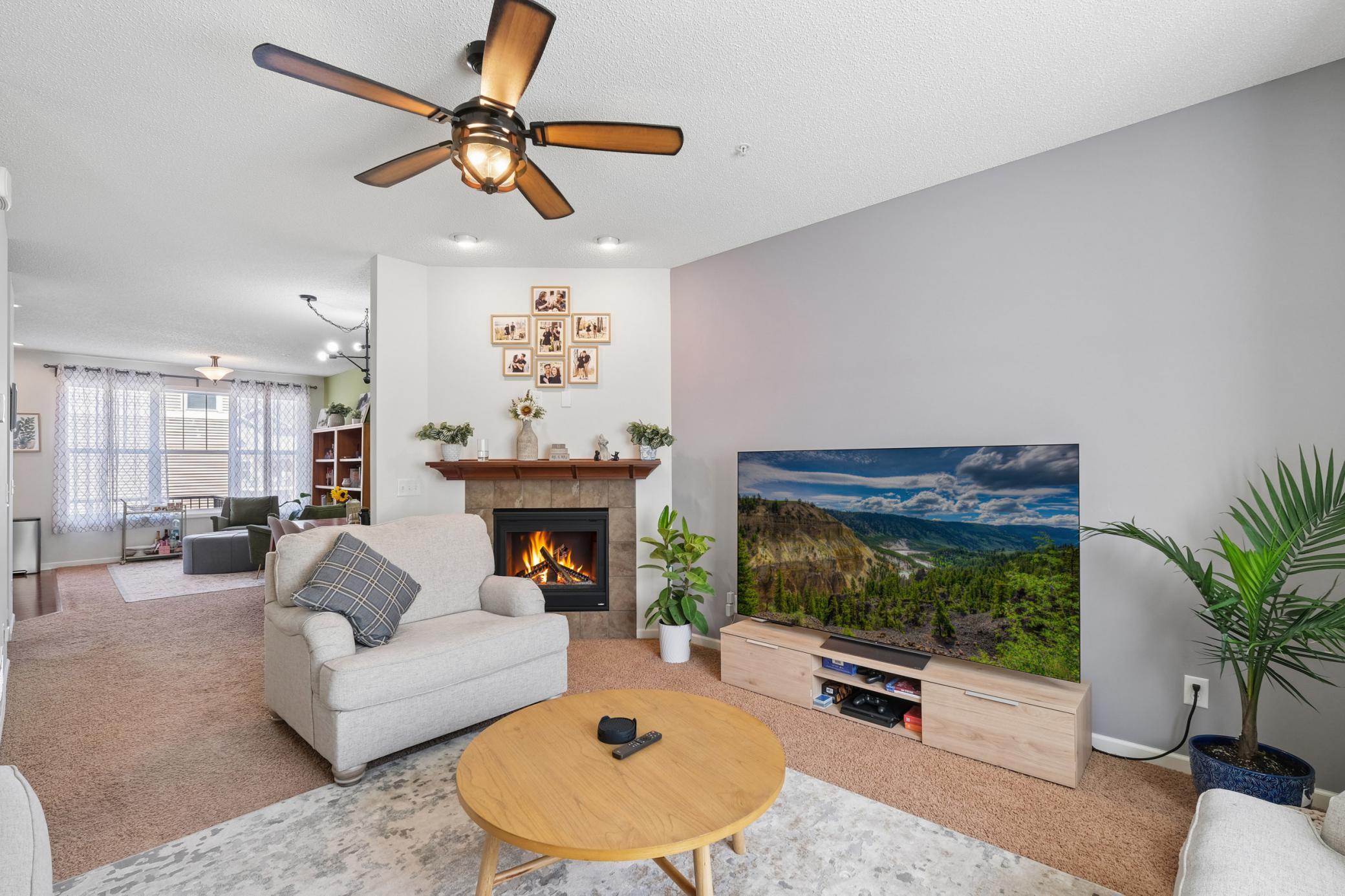 Open concept living room with built in gas fireplace
