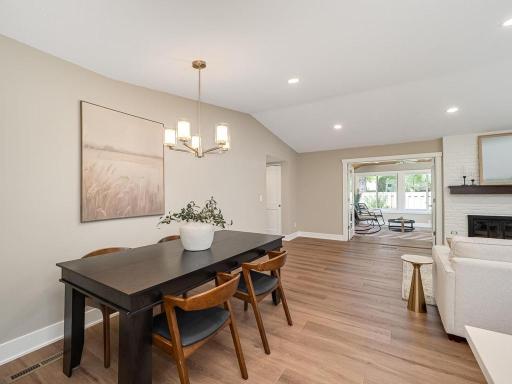 An inviting dining space that seamlessly connects to the beautifully renovated kitchen and open living area.