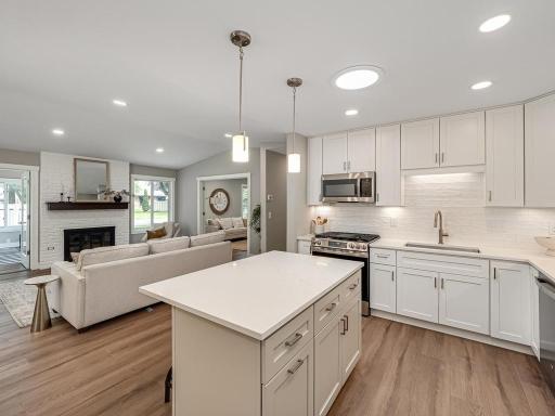New recessed lighting and updated fixtures throughout the home enhance the fresh, contemporary feel of this complete renovation.