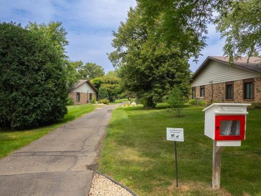 Enjoy the Cimarron Ponds Lifestyle: Step outside your door and onto the community walking paths, with easy access to the outdoor pool, pickleball courts, and a charming Little Free Library for neighbors to share and discover books.