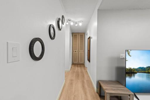 The hallway provides convenient access to the bedrooms and bathroom.