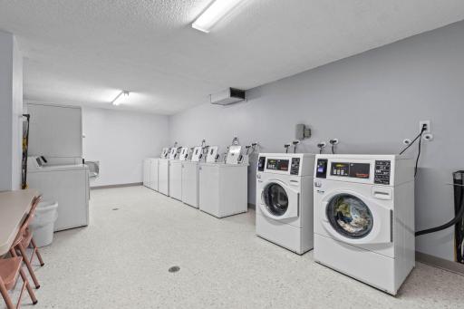 Community laundry room offering convenient access to on-site laundry facilities.