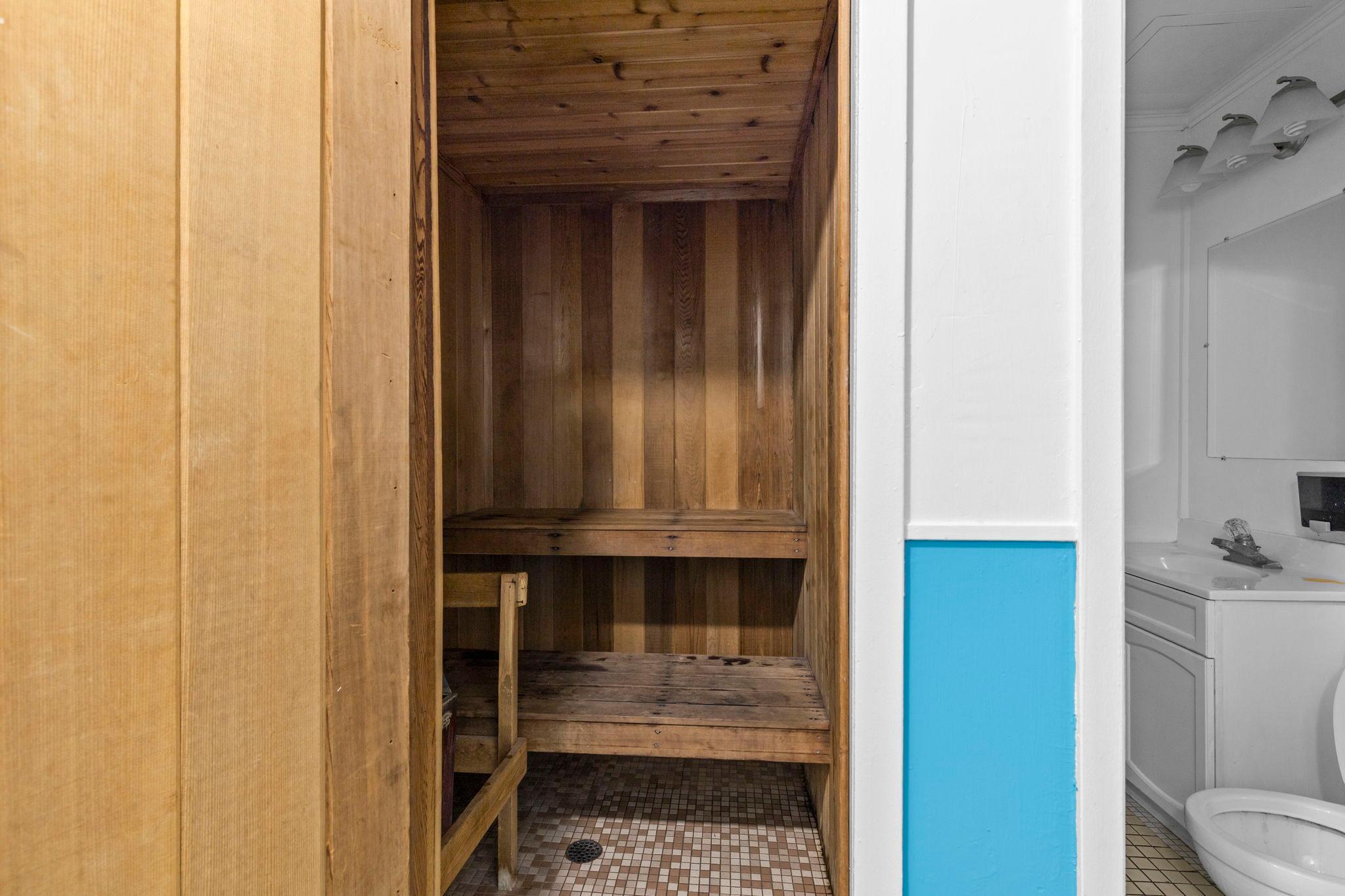 Shared spa-like sauna providing a peaceful space to relax and unwind.