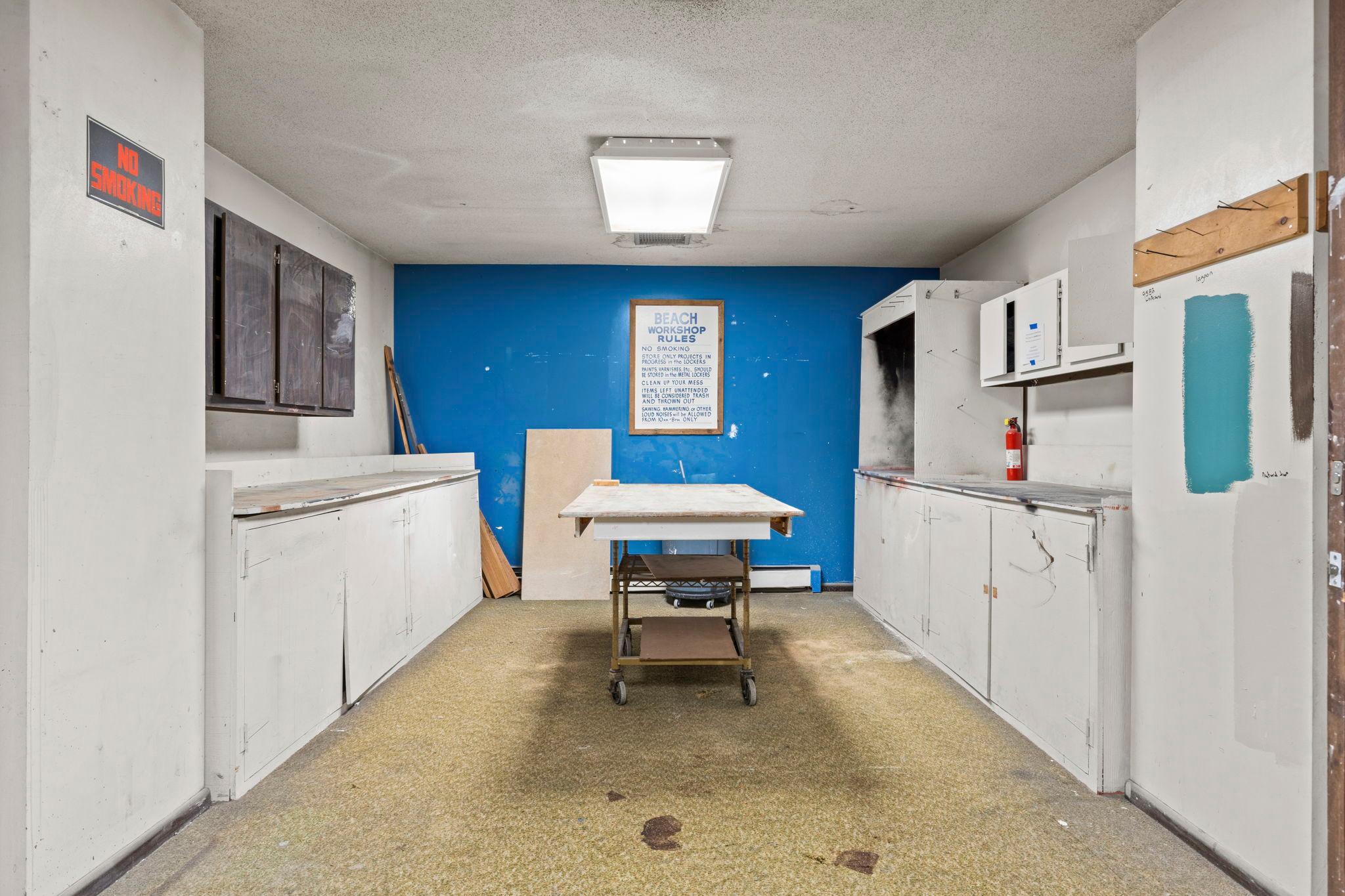 Community workshop room offering a dedicated space for projects, hobbies, and creative pursuits.
