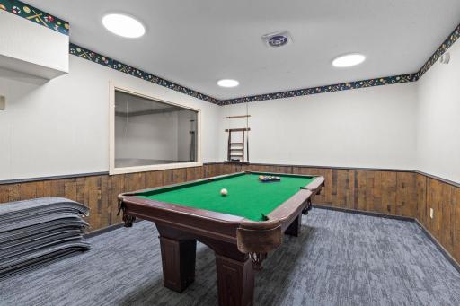 Pool table recreation space providing a fun area for entertaining.