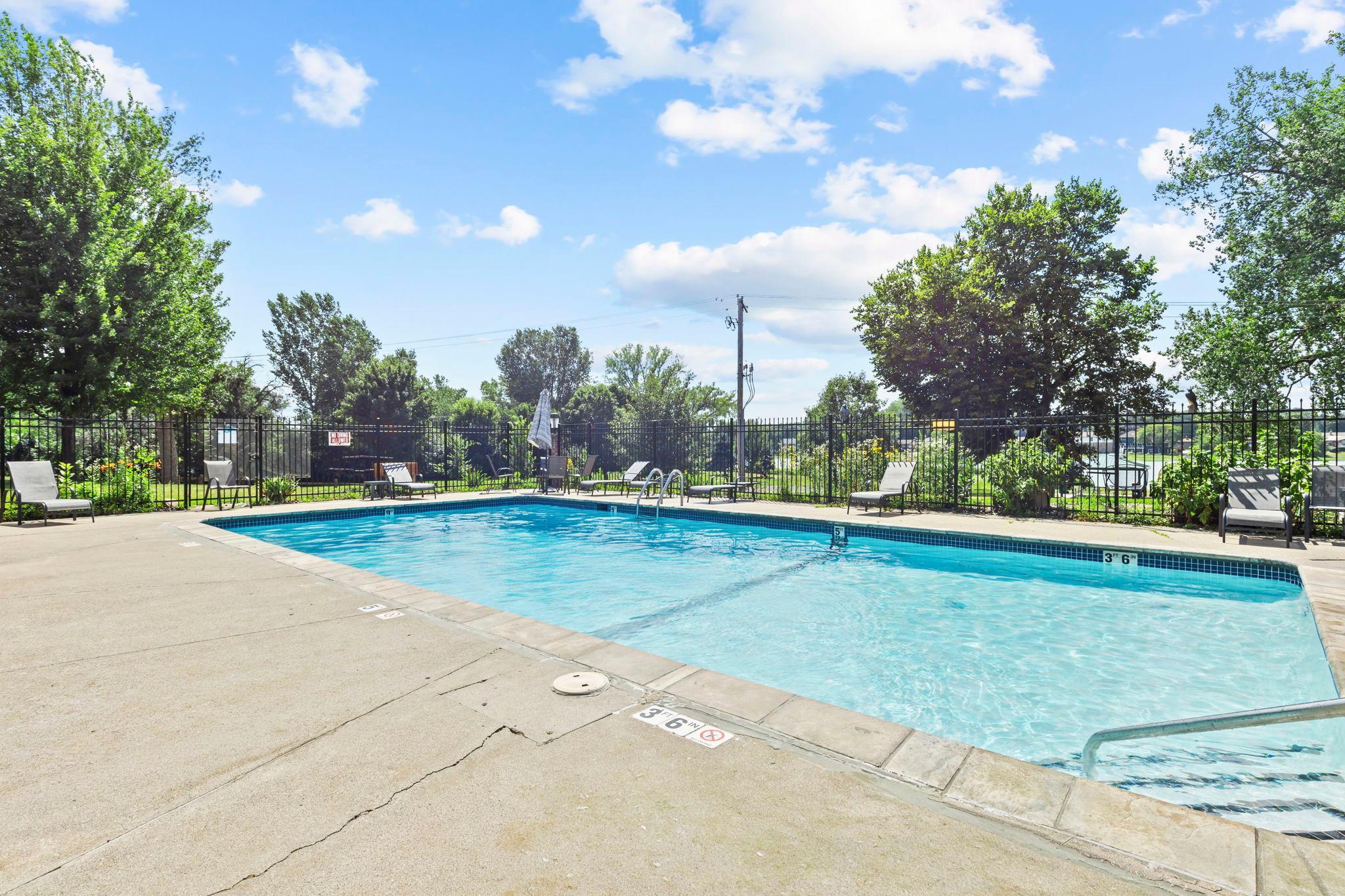 The shared community pool offers the perfect space for enjoying summer days, relaxing, and creating lasting memories.