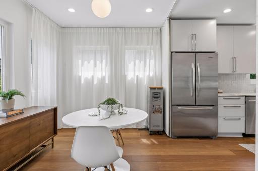 Another view of the informal dining and kitchen.