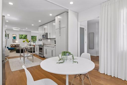 Informal dining area, with movable-track room separator.