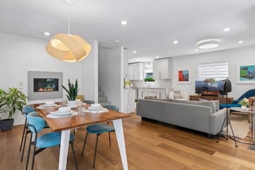 The front entry opens to the open-concept living and dining room with gas fireplace.