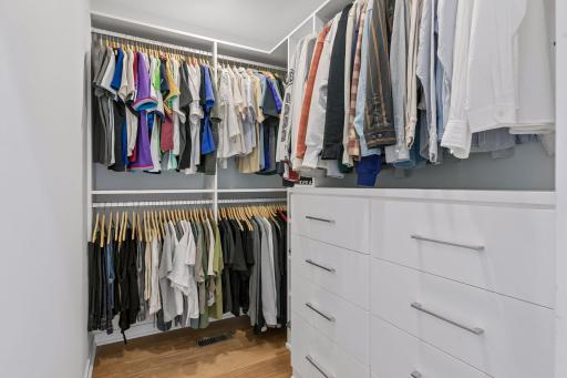 Custom California Closet system in primary bedroom walk-in closet, installed in 2024.