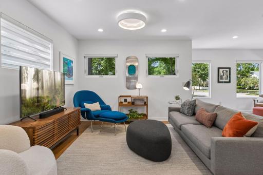 Motorized blinds on front-facing windows, for convenience and privacy.