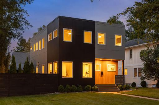 This modern 4-bedroom, 3-bathroom Macalester-Groveland home sits on an oversized corner lot on a tree-lined boulevard with a fully private backyard and exquisite updates throughout.