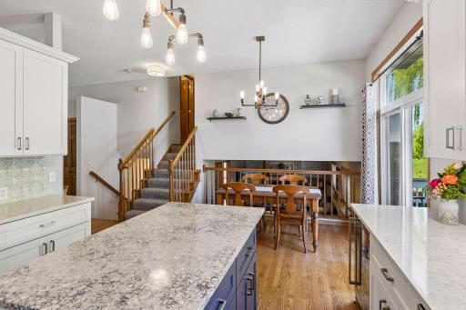 If you were talented, you could do a hockey slapshot of a cookie directly from this counter into a person's mouth in the lower living room.