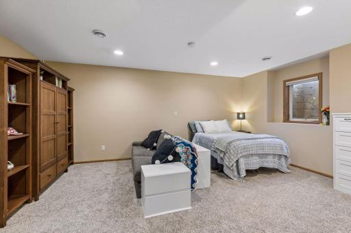 Lower level bedroom is massive and perfect for family, guests, or another living room!