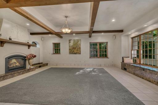 The great room boasting beautifully architected beams framing in the space.