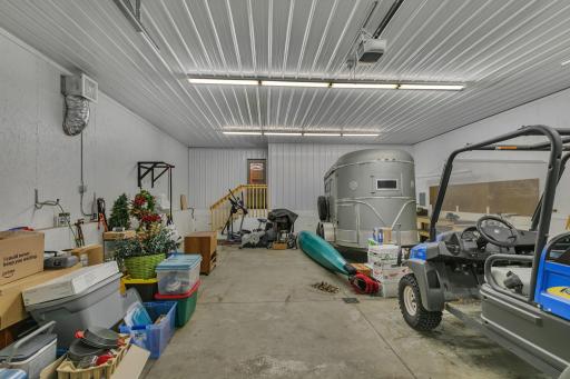 Generously insulated shop with room for the toys, your business equipment or space to do all those projects.