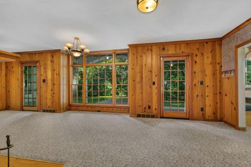 Dining room/sitting room overlooks the peaceful front porch/patio.
