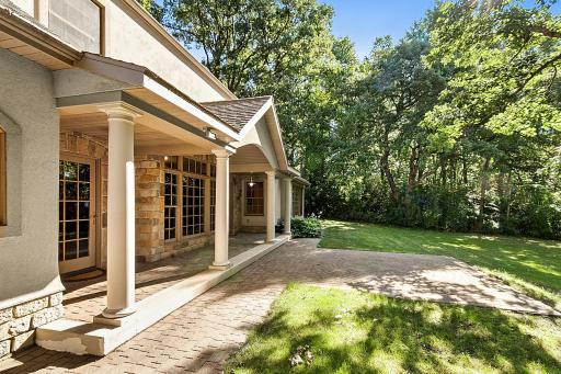 Patio off the porch overlooks 202 acres of the Stearns County Park.