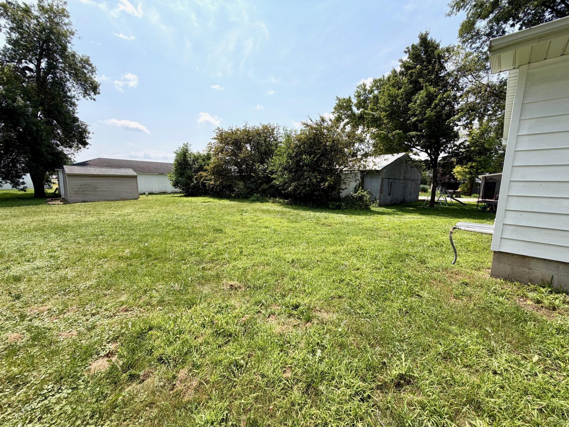 Level backyard with 10 x 14 storage shed.jpg