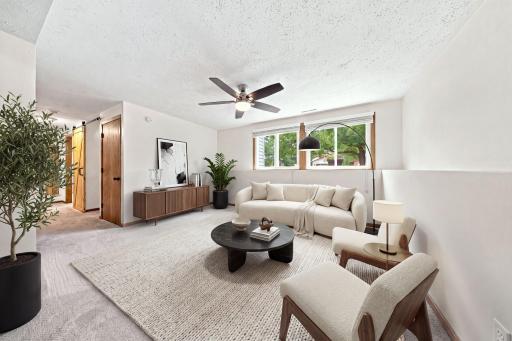 Virtually staged to showcase the possibilitiesâimagine relaxing, entertaining, or gathering with family in this spacious lower-level retreat.