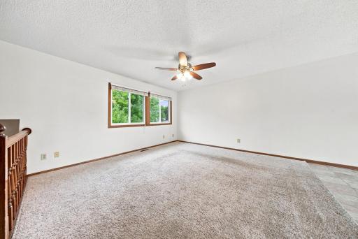 Expansive main living area with soaring ceiling and an open, airy feel.