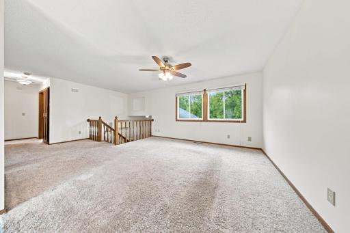 Open-concept layout seamlessly connects the living room and dining area