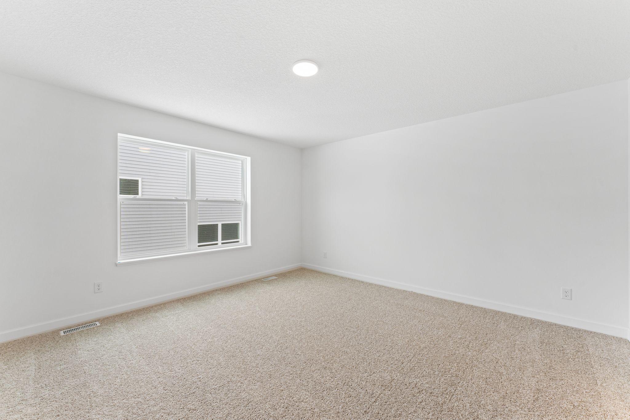 Photo of a similar home, actual finishes may vary