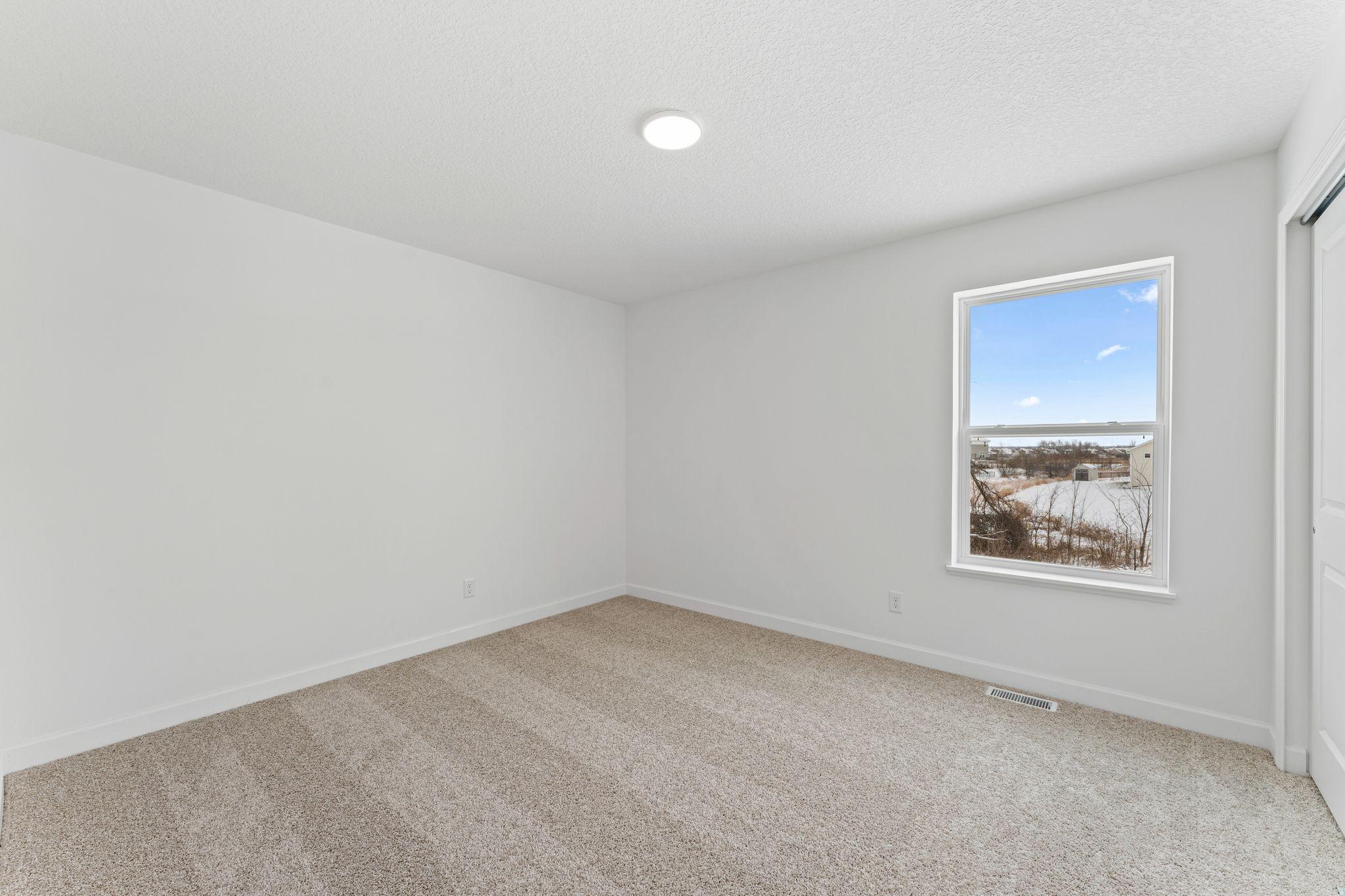 Photo of a similar home, actual finishes may vary