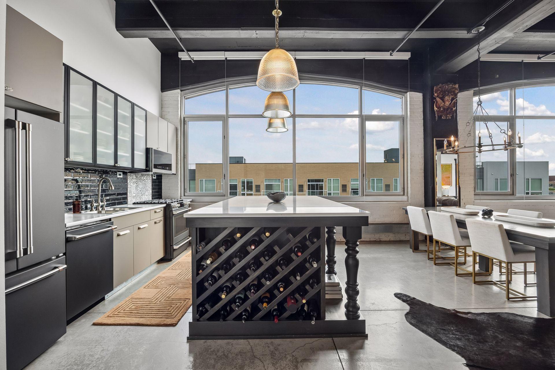 A straight-on view of the island highlights the integrated wine rack—an intentional detail that blends function with design.