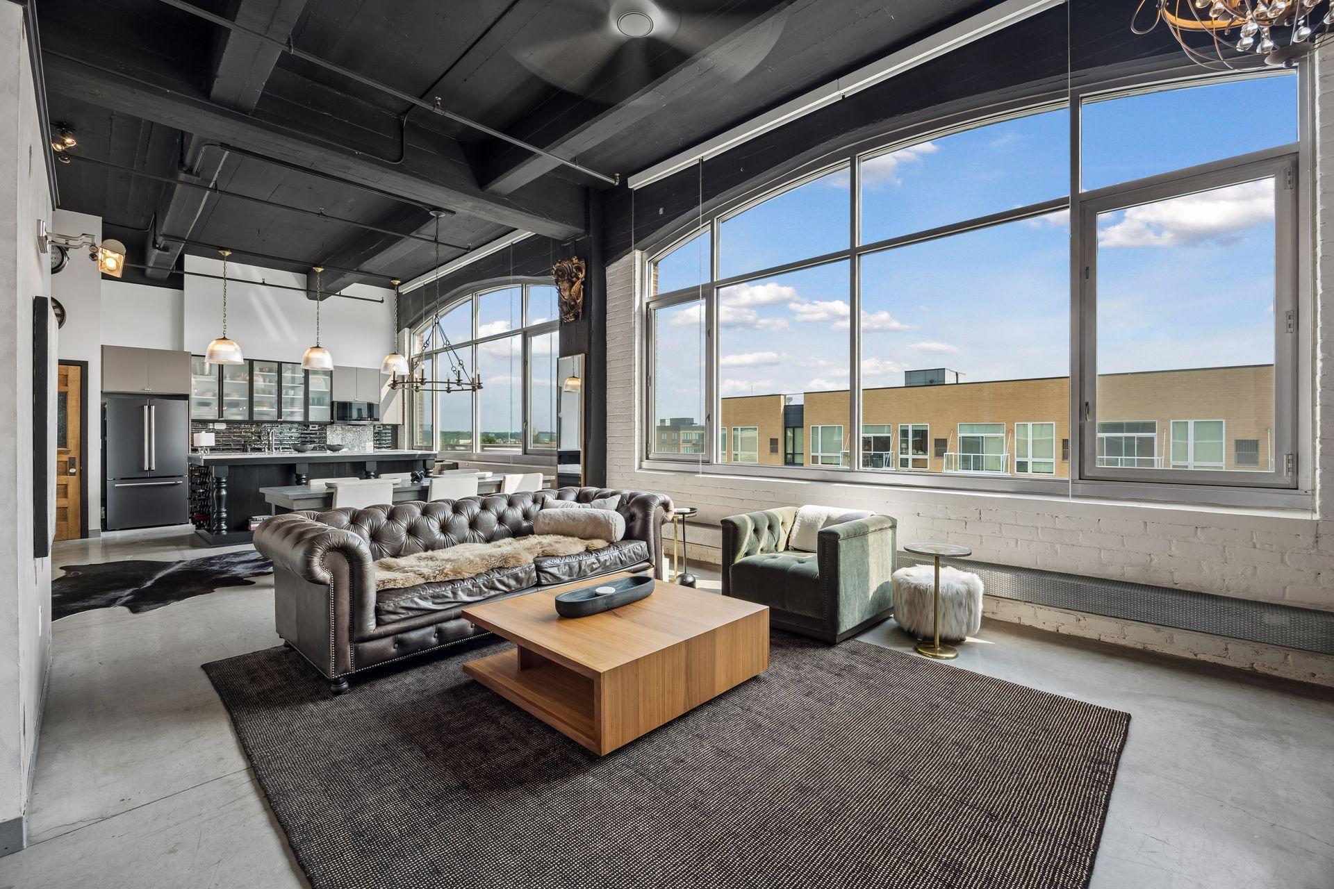 Welcome to this extraordinary North Loop residence located in the iconic Tower Lofts building.