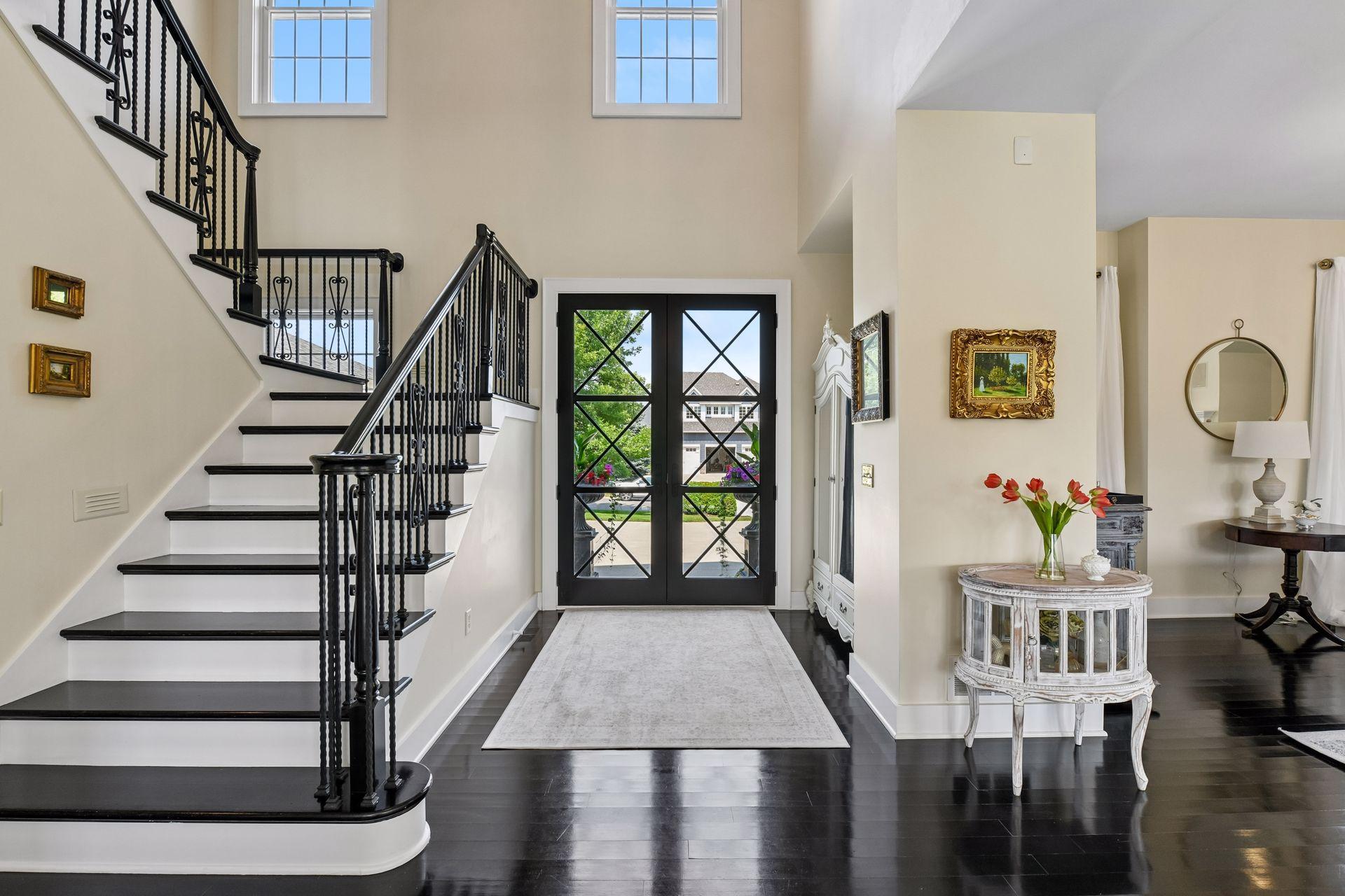 Beautifully updated, the home enjoys new front doors.