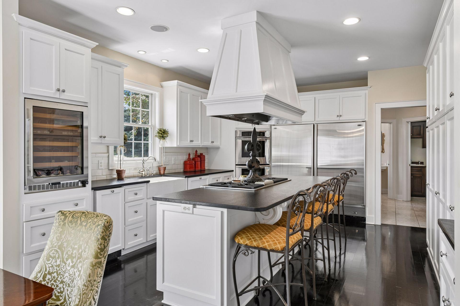 A true chef's Kitchen complete with professional appliances from Thermador, Sub-Zero and Bosch.