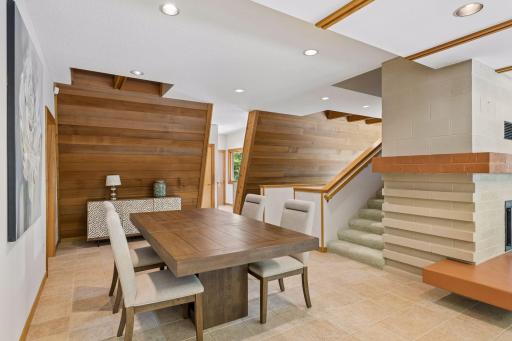 Architecturally angled redwood wall in dining room