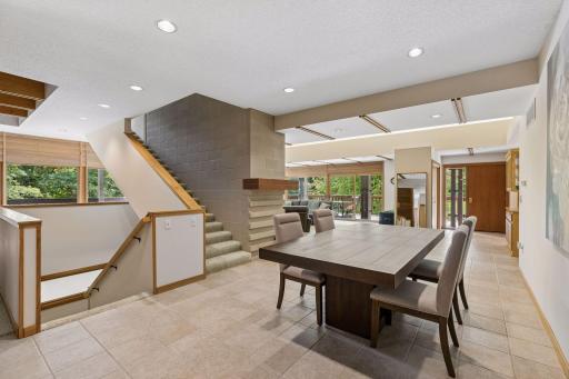 Formal dining room with tiled flooring and room to expand for large gatherings.