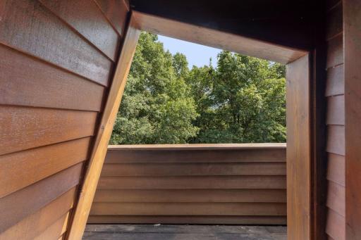 Small upper-level deck from inside the home